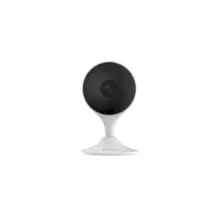 Desktop webcam with a black circular camera lens on a white stand, facing forward.