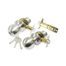 Two silver door knob locksets with mounting plates and keys on a white background